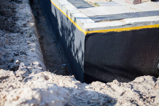 Professional Waterproofing technician working in Sewanee, TN